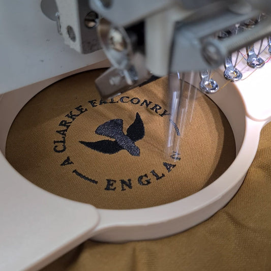 Our logo being embroidered onto our new Arab style Falconry bag...