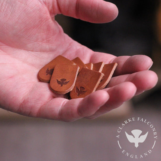 Our new logo tabs ready to be sewn onto our Stretton Falconry bags...