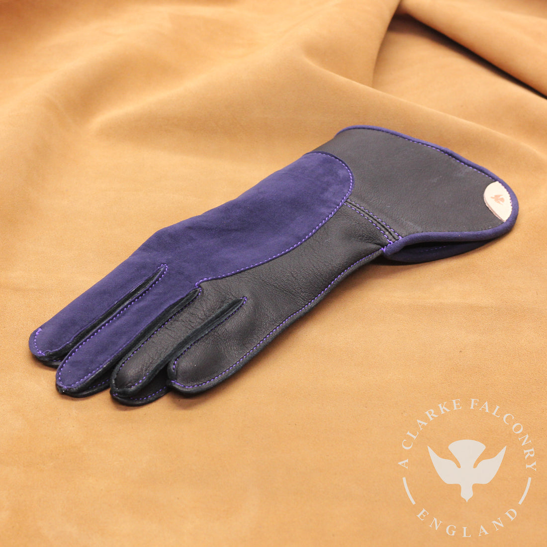 We love the purple stitching on this bespoke double thickness glove!